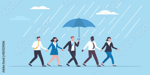 Team walking together under an umbrella in the rain