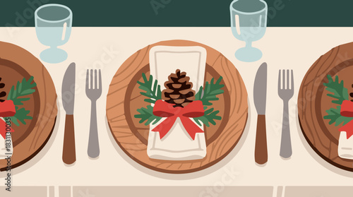 Table setting with pine cone and greenery on wooden plates for Thanksgiving  