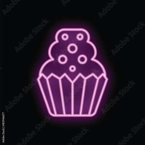 Neon sign illuminating a cupcake with frosting, perfect for bakery or food related businesses