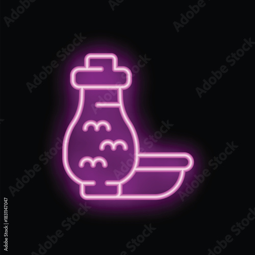 Neon sign depicting a traditional chinese tea ceremony set, with a gaiwan and a teacup, glowing pink on a black background