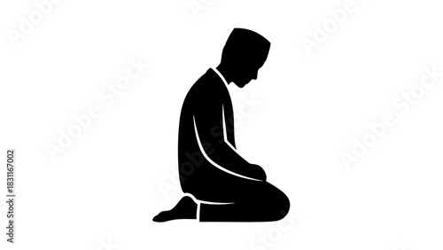 A black silhouette of a man kneeling with his head bowed, in a posture of prayer or contemplation.