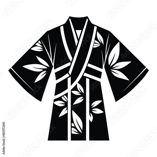 Isolated black kimono displays white leaves against a solid background for fashion inspiration
