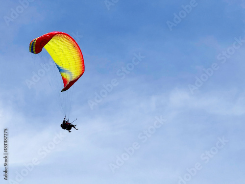 Colorful Tandem Flight Above Sky
