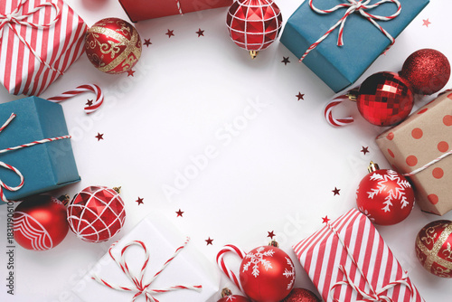 Christmas frame with gift boxes and balls on white