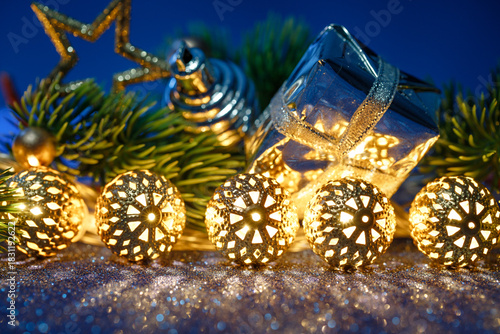 Golden lights enhance celebration atmosphere, Warm illumination creates cozy holiday party setting