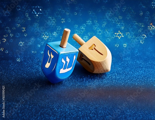 Hanukkah Celebration: Two Dreidels on a Star-Studded Blue Backdrop for a Festive Holiday Spirit.