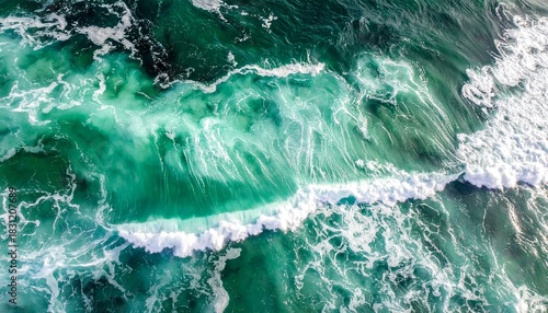 Fototapeta Naklejka Na Ścianę i Meble -  Ocean waves crashing turquoise water.