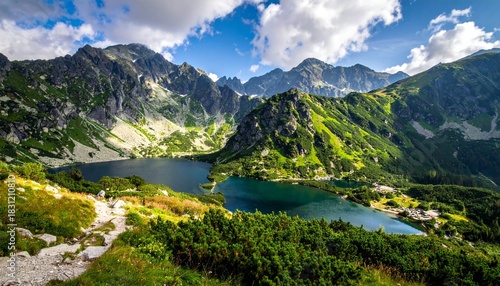 Fototapeta Naklejka Na Ścianę i Meble -  Scenic mountain lake with vibrant nature.