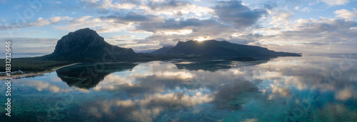 Panoramic view of Le Morne Bay and Le Morne Mountain at sunrise, Mauritius