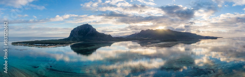 Panoramic view of Le Morne Bay and Le Morne Mountain at sunrise, Mauritius