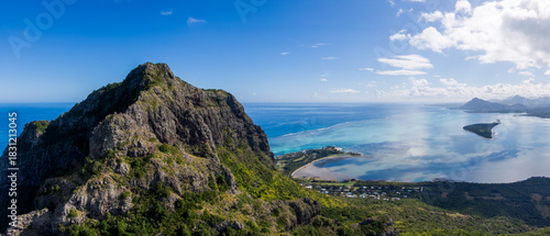 Aerial view of Le Morne Mountain summit with peninsula and ocean, Mauritius