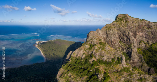 Aerial view of Le Morne Mountain summit with peninsula and ocean, Mauritius