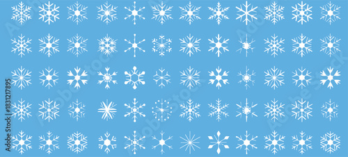 Delicate snowflakes on a light blue backdrop evoke winter magic. Perfect for festive holiday designs, adding a touch of seasonal elegance and cheer.