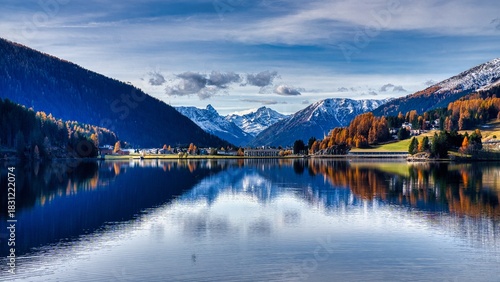 Davos. Mountain Lake Serenity, Peaceful Alpine Reflecting Snow Peaks, Calm Alpine Water Mirror Showcasing Snowy Mountain Silhouettes And Clear Skies