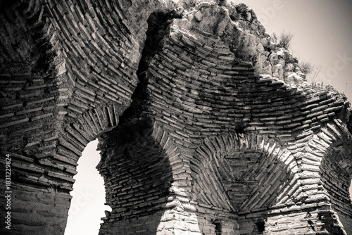 Fototapeta Naklejka Na Ścianę i Meble -  Iznik Castle gate, walls and water channel in Türkiye 2025 