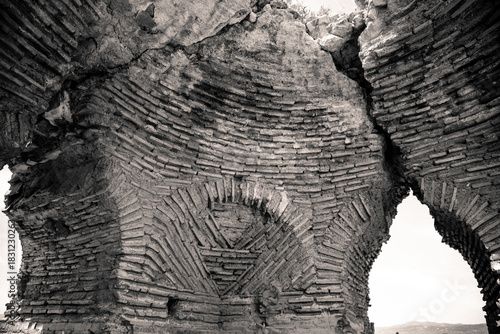 Fototapeta Naklejka Na Ścianę i Meble -  Iznik Castle gate, walls and water channel in Türkiye 2025 