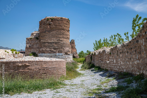Fototapeta Naklejka Na Ścianę i Meble -  Iznik Castle gate, walls and water channel in Türkiye 2025 