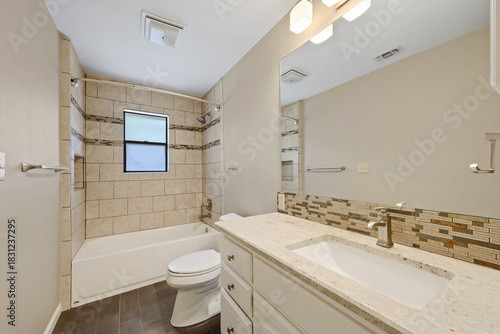 Wallpaper Mural A wellequipped bathroom featuring a toilet, sink, and a bathtub Torontodigital.ca