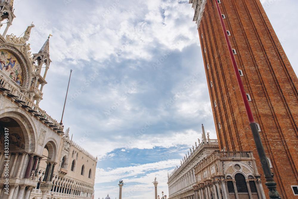 Naklejka premium St Mark's Square architecture featuring campanile and Doge's Palace in Venice Italy