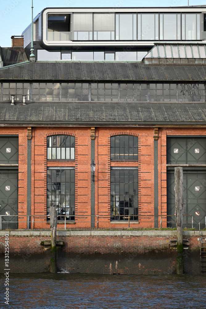 Fototapeta premium Nautic Vessels, Ships and Buildings at Hamburg Landungsbrücken. Fischauktionshalle. Silhouette.