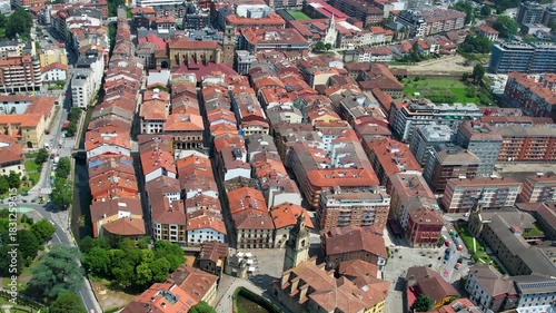 An aerial wide view above the city Durango in Spain, Basque on a sunny spring day. 