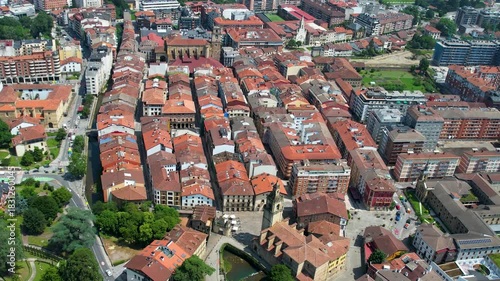 An aerial wide view above the city Durango in Spain, Basque on a sunny spring day. 