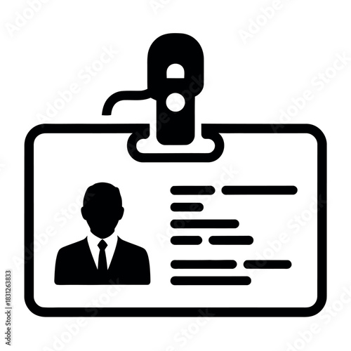 An identification card with a silhouette of a person and lines of text is clipped by a metal clasp.