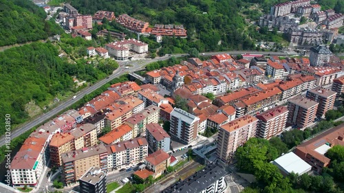 Aerial panoramic view of the downtown in the city Elgoibar in Spain on a sunny spring day. 