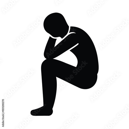 Silhouette icon representing a person sitting down in deep thought or sadness