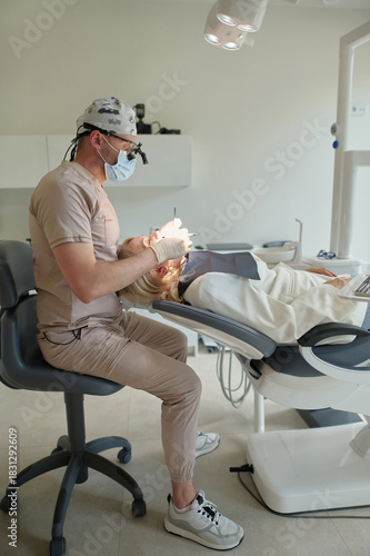 the woman consults a dentist