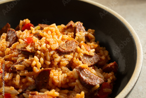 A closeup view of a bowl of jambalaya.