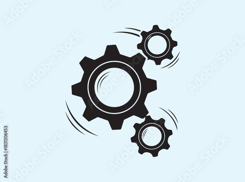 Black Silhouette of Interlocking Gears with Motion Lines
