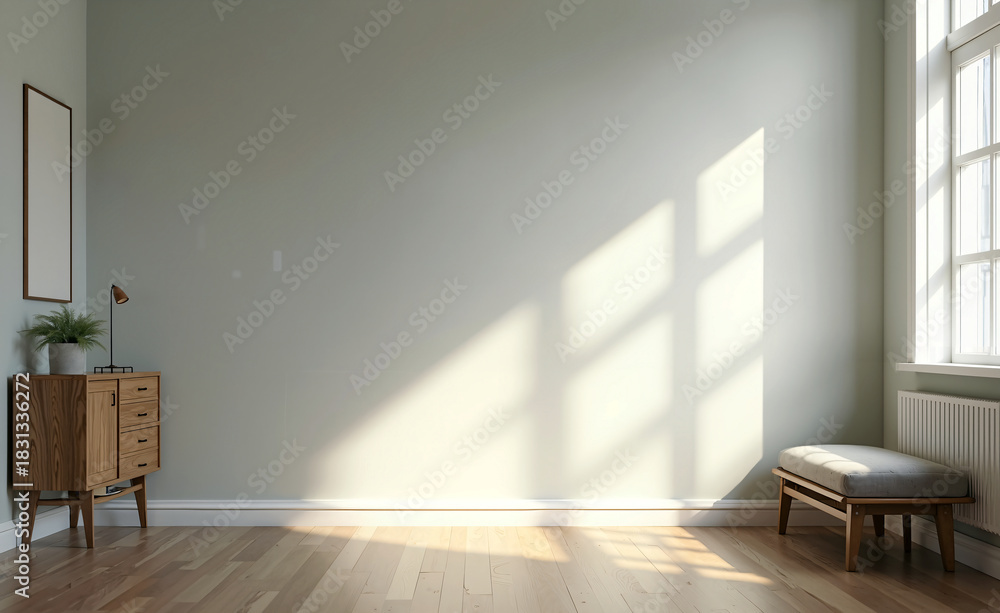 Fototapeta premium Minimalist interior with wooden cabinet, bench, and large window casting warm sunlight across a calm modern room.