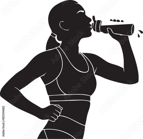 Silhouette of fit woman drinking water from bottle after workout