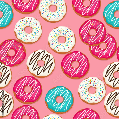 A playful pattern of donuts features vibrant pink, teal, and white frosting topped with rainbow sprinkles and wavy drizzles, scattered across a cheerful bubblegum pink background