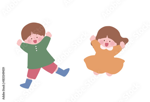 笑顔でジャンプしている　男の子と女の子