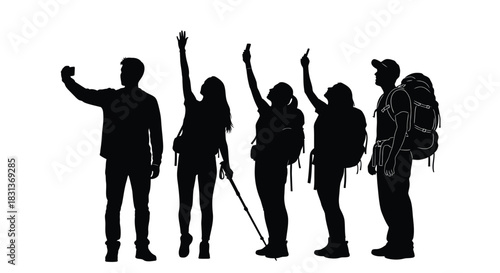 Silhouette hiking group enjoying nature and taking photographs