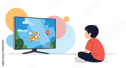 A young boy sits on the floor, attentively watching a cartoon of a playful dog and a butterfly on a television screen.