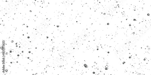 Seamless grunge texture distressed overlay with scattered paint specks dust and noise vector background black and white