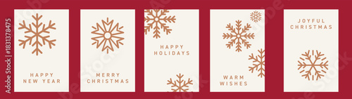 Christmas baubles arranged on a blue background, creating a festive holiday card design. Decorative Christmas ornaments forming a border. Merry Christmas and Happy New Year backdrop.