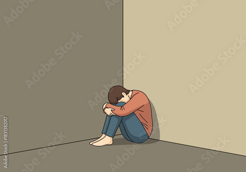 Person curled up in a corner, appearing sad and isolated.