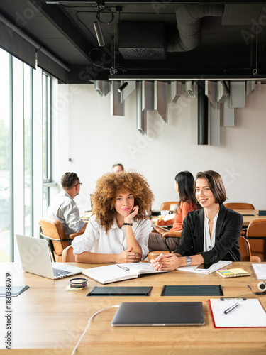 Wallpaper Mural Professional Women Collaborating in Bright Modern Office  Torontodigital.ca