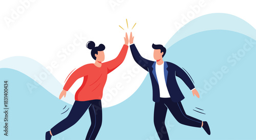 Two happy and successful business colleagues are jumping and giving each other a high five to celebrate their achievement.