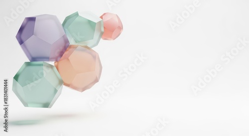 Cluster of translucent, pastel colored geometric solids floating against a bright white background