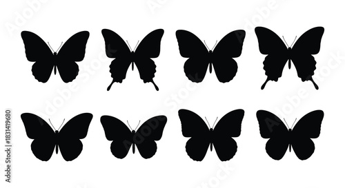 A collection of black butterfly silhouettes arranged in a simple grid pattern