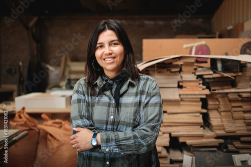 Latina Woodworker Smiling in Studio