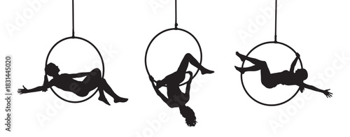 Silhouette of three acrobats performing aerial hoop routines, showcasing dynamic poses and graceful movements against a clean backdrop.