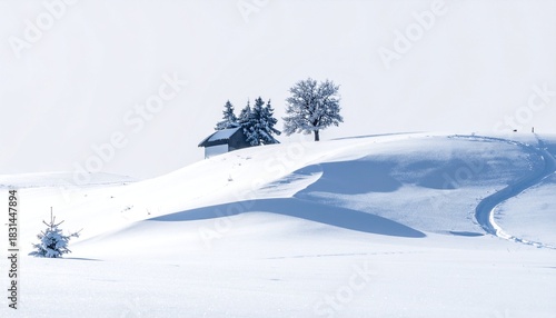 Winter scene with chapel and snowy hill.