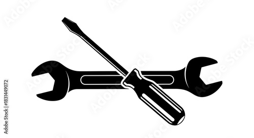 Professional wrench and screwdriver crossed for a powerful symbol of repair, construction, and mechanical solutions