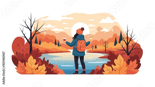 Embracing the cozy solitude of fall, a woman with a backpack stands by a tranquil lake enjoying the vibrant autumn forest landscape